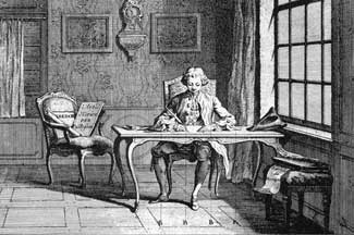 Man writing at a desk